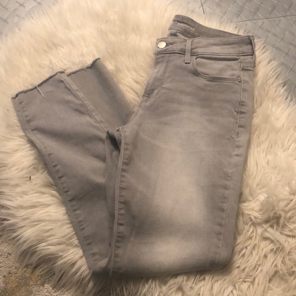 Light Gray Wash Jeans with Distressed Bottoms